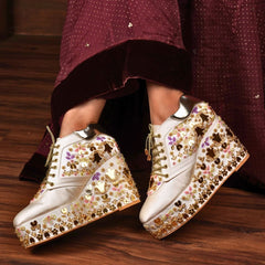 Custom white multi color embroidery bridal sneaker wedges.